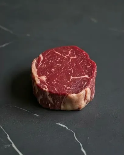 Medallón de filete pasando de crudo a A Punto en la parrilla